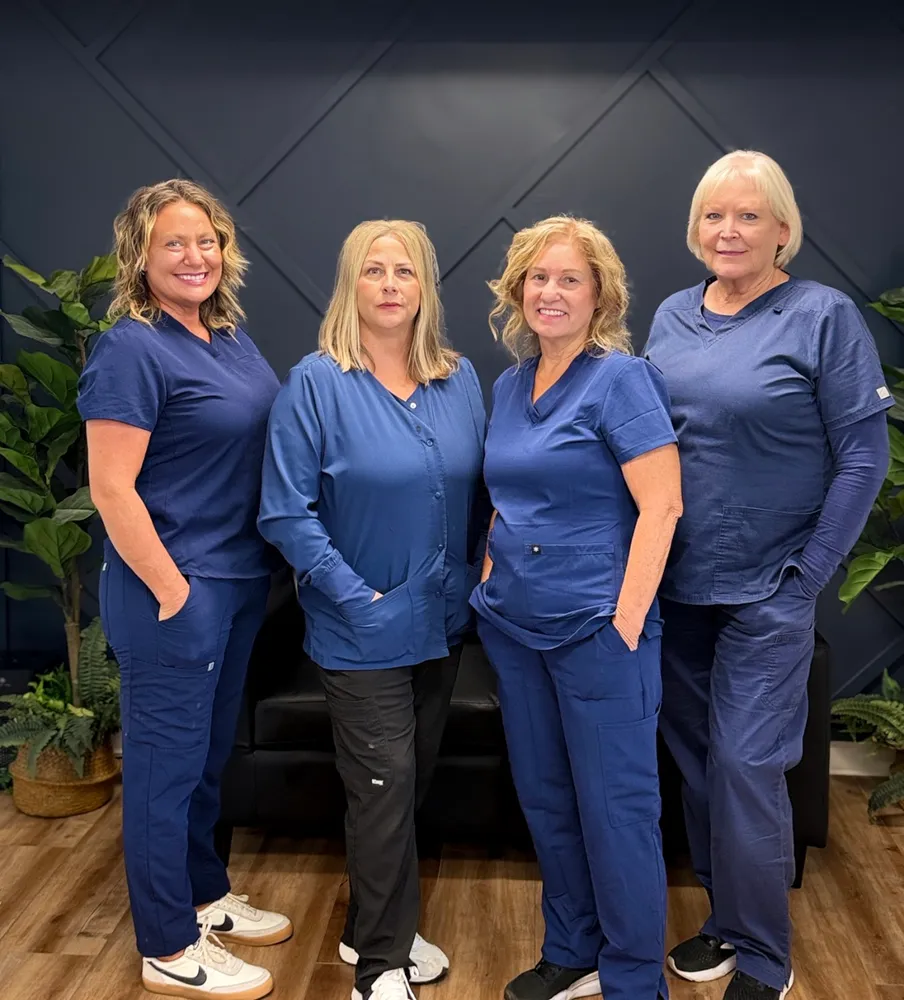 The hygiene team: Cheryl, Tammy, Lynn, and Michelle in the office